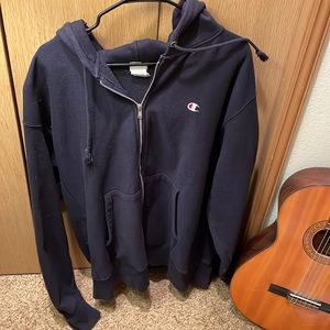 reverse weave champion zip down, used but great condition, navy blue color